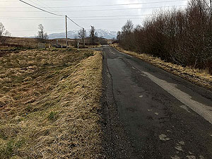 Loch Katrine marathon. This section of road is the halfway point. Round the cone and back to the start. Our picture taken some months after the actual race so the cone has gone back to its cupboard.