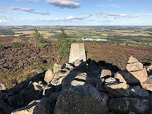 Meikle Tap. Trig point and cairn towards the east