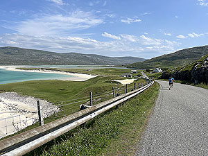 Harris half marathon :runners passing Seilebost beach